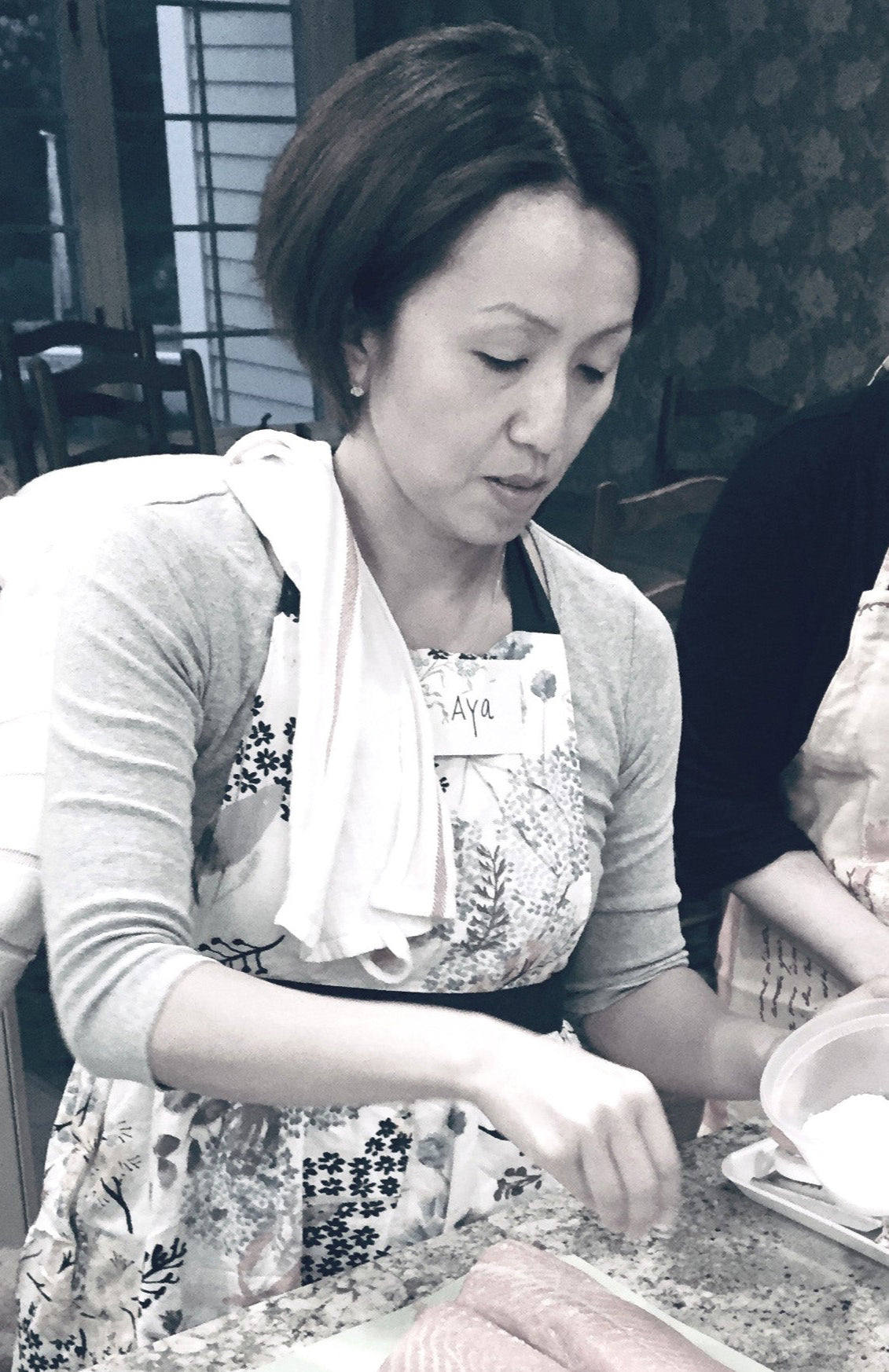 Aya cooking a salmon dish